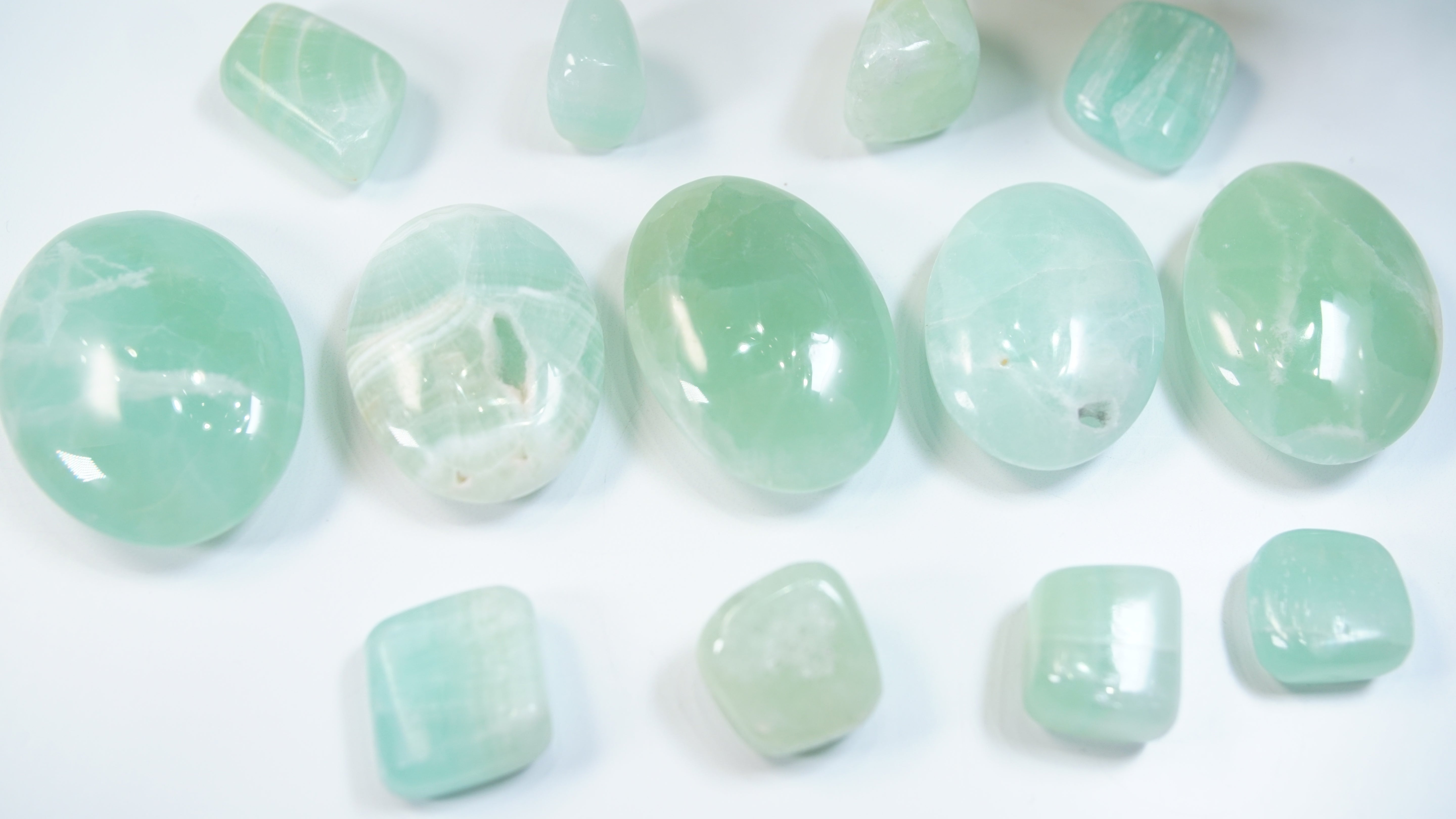 Pistachio Calcite Palms & Tumbles From Pakistan - Intuitively Selected