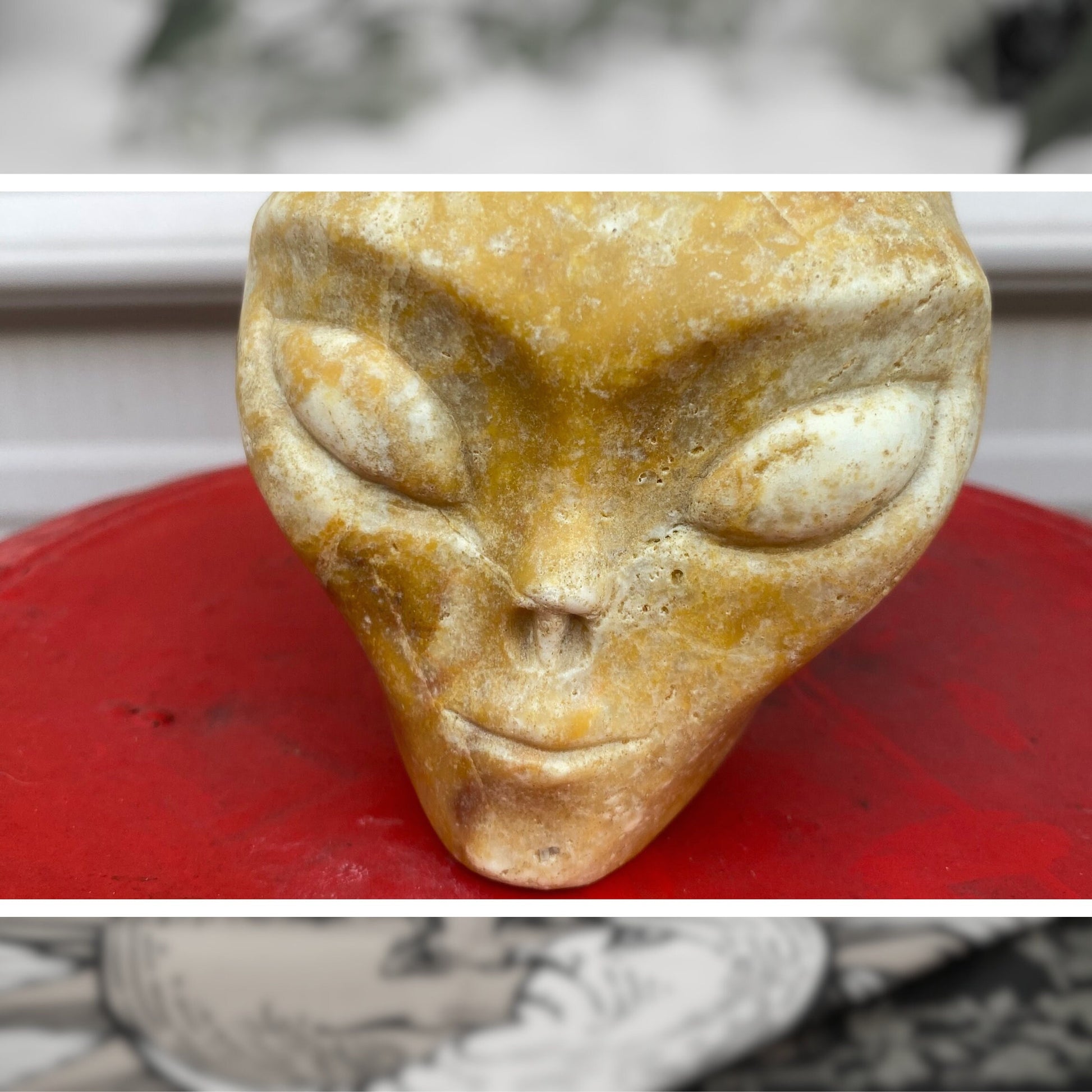 yellow jasper alien skull crystal closeup